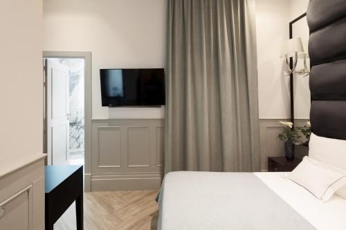 Hotel MiM Ibiza & Spa - Adults Onlyにあるベッド