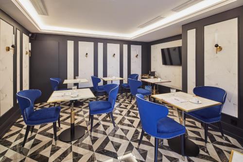 Hotel MiM Ibiza & Spa - Adults Onlyにあるテレビまたはエンターテインメントセンター