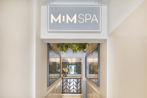 Hotel MiM Ibiza & Spa - Adults Onlyに飾ってある許可証、賞状、看板またはその他の書類