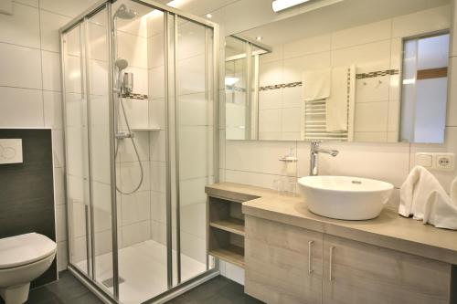 Ein Badezimmer in der Unterkunft Hotel Weiler - Aktiv & Tradition