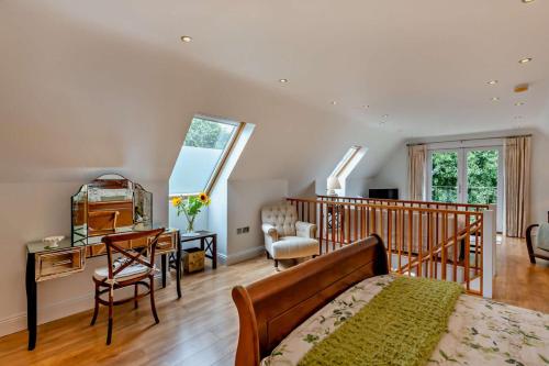 Ένα ή περισσότερα κρεβάτια σε δωμάτιο στο Field House Lodge