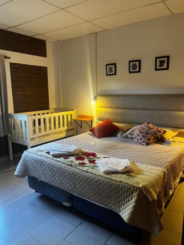 a bedroom with a bed in a room at Las Catalinas cabañas in San Fernando del Valle de Catamarca