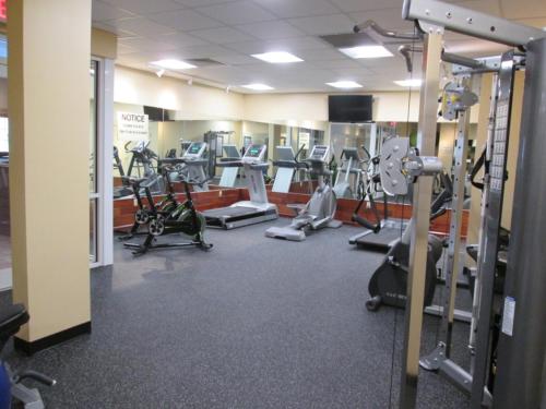 a gym with several treadmills and exercise bikes at Jiminy Peak Mountain Resort in Hancock