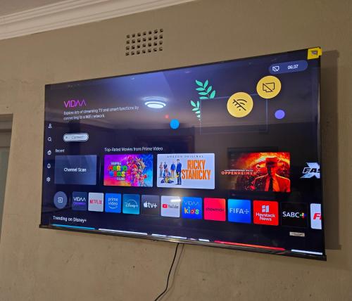 a wall with a display of different types of screens at Sandown Suites and Conference Centre in Johannesburg