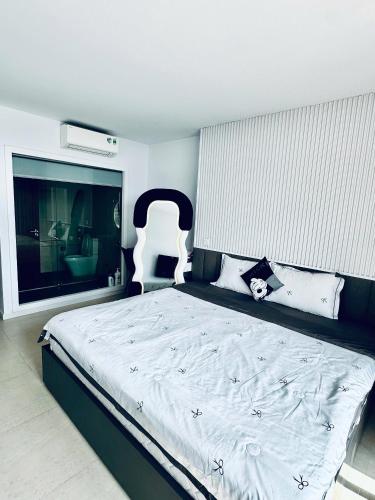 Letto o letti in una camera di CSJ Seaside - Căn Hộ Cạnh Biển