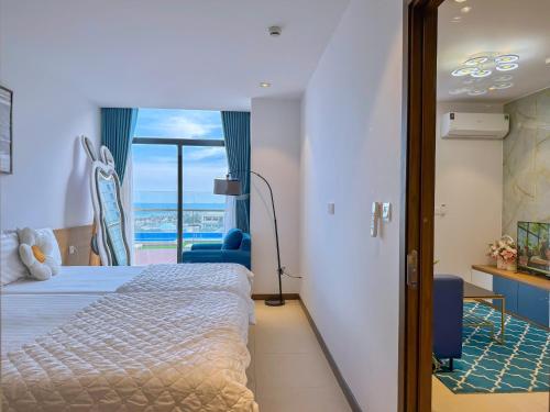 Letto o letti in una camera di CSJ Seaside - Căn Hộ Cạnh Biển