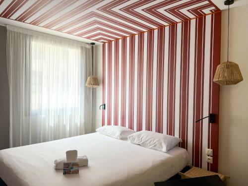 Un ou plusieurs lits dans un hébergement de l'établissement ibis Styles Nimes Gare Centre