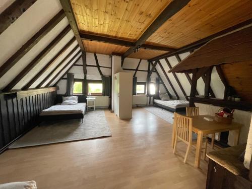 Postel nebo postele na pokoji v ubytování Hirschhaus