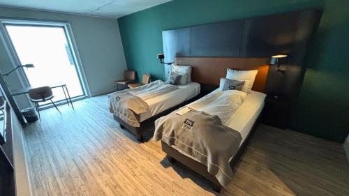 Holiday Inn - the niu, Fender Amsterdamにあるベッド