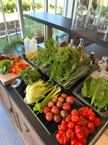 a bunch of vegetables sitting on a counter top at Ekenäs Gård på Österlen in Kivik
