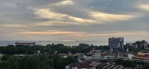 a view of a city with a ship in the water at PD D'Wharf The Bay Superior Queen Room SeaView Balcony in Port Dickson