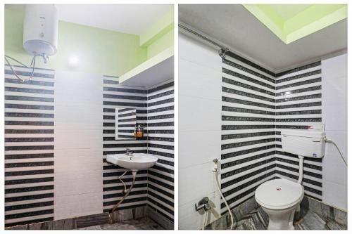 a bathroom with black and white stripes on the wall at Hotel O Maharaja Galaxy in Bankipur