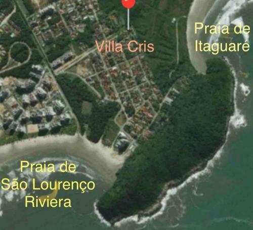 a map of a island with a red marker at Residencial Villa Cris - Jd. São Lourenço/Itaguaré in Bertioga