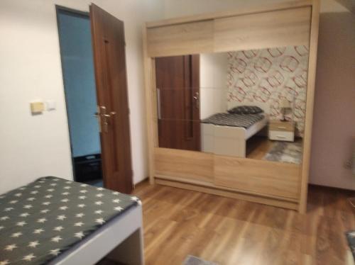Una cama o camas en una habitación de Apartmány City