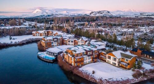an aerial view of a home in the snow at Blue Aparts Dina Huapi Bariloche in Dina Huapi