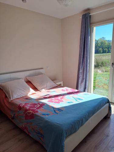 Ένα ή περισσότερα κρεβάτια σε δωμάτιο στο Appartement La pierre de bresse