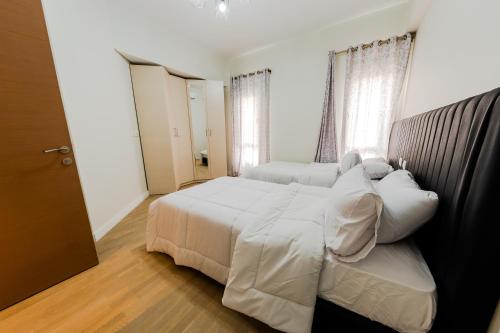 Postel nebo postele na pokoji v ubytování Mivida Apartments New Cairo By O Residence Families Only