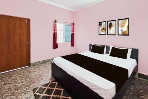 Ένα ή περισσότερα κρεβάτια σε δωμάτιο στο Hotel O Royal Heritage Resort