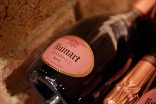 a bottle of wine with a label on it at Hotel Neue Post in Mayrhofen
