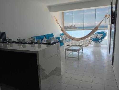 Apartamento de lujo frente al mar en residencia con piscina, planta electrica y gym