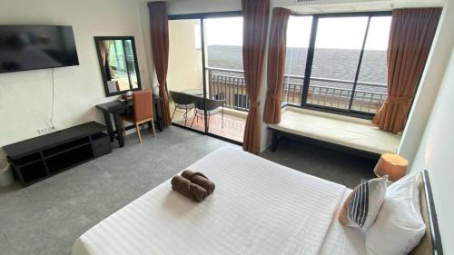 Cama o camas de una habitación en Sunset Bay View Phuket
