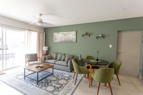 a living room with a couch and a table at No 19 at 1 on York - luxury townhouse in George
