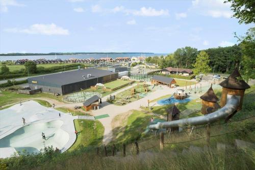 a rendering of a water park with a slide at 40342-Juelsminde-Niels-Rasmussens-Vej-125 in Sønderby