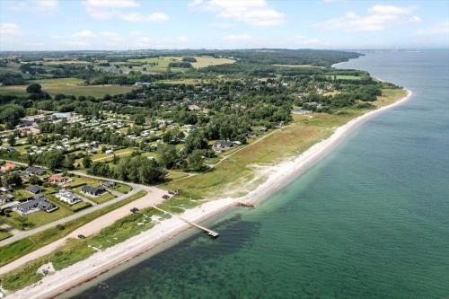 an aerial view of a beach next to the water at 30098-Malling-Norsmindevej-171-K in Malling