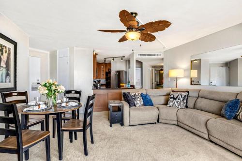 a living room with a couch and a table at Napili Point by KBM Resorts in Kaanapali