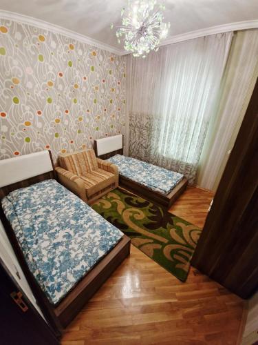 Llit o llits en una habitació de QEBELE Rayon