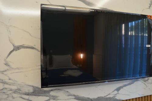 Μια τηλεόραση ή/και κέντρο ψυχαγωγίας στο Cem's Luxury Apartment