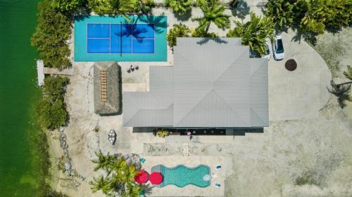 an overhead view of a house and a swimming pool at Infinite Horizons by Last Key Realty in Stock Island