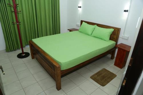 Una cama o camas en una habitación de D Family Residence