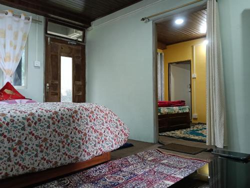 Ένα ή περισσότερα κρεβάτια σε δωμάτιο στο Grace Homestay