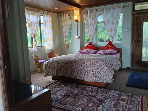Ένα ή περισσότερα κρεβάτια σε δωμάτιο στο Grace Homestay