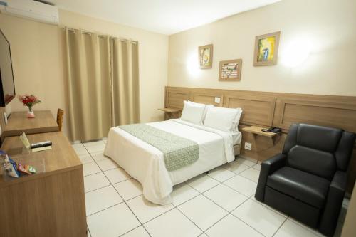 Katil atau katil-katil dalam bilik di Hotel Dona Beja