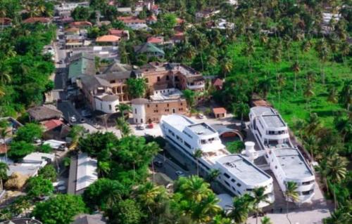 an aerial view of a parking lot with parked vehicles at Beach Bungalow 100 m Playa Coson in Las Terrenas