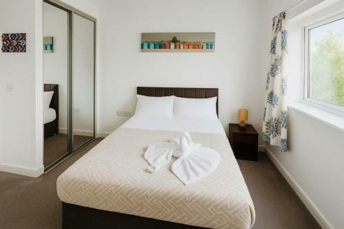 Ένα ή περισσότερα κρεβάτια σε δωμάτιο στο Modern two-bedroom flat fully equipped