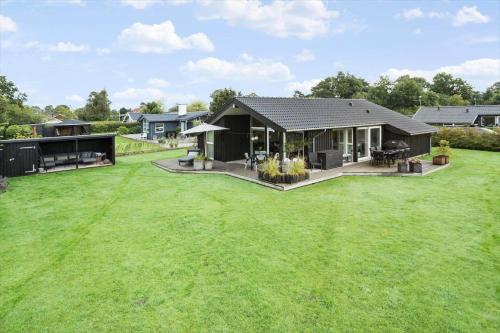 a house with a large lawn in front of it at 30178-Odder-Chr-Christensensvej-9 in Beder