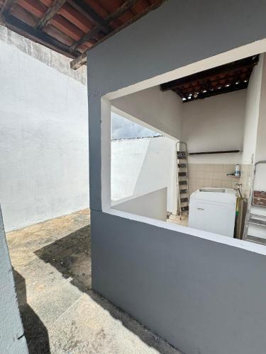 a window in a building with a toilet in it at Otima casa bem localizaca para 6 a 8 pessoas in São Luís