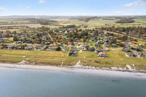 an aerial view of a town next to the water at 40387-Juelsminde-Frede-juels-vej-306 in Sønderby