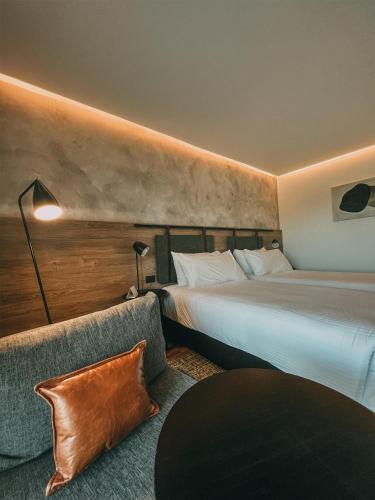 Postel nebo postele na pokoji v ubytování Böden Hotel & Spa, AKEN SOUL