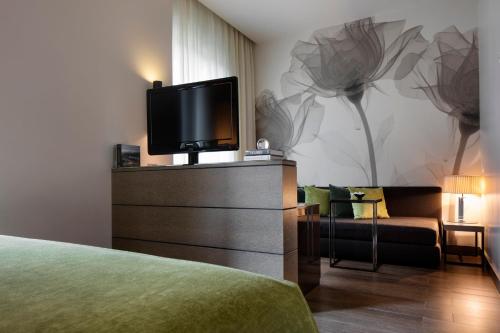 TV a/nebo společenská místnost v ubytování Starhotels Echo