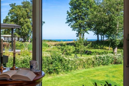a window view of the ocean from a house at 30074-Malling-Musvitvej-4 in Malling