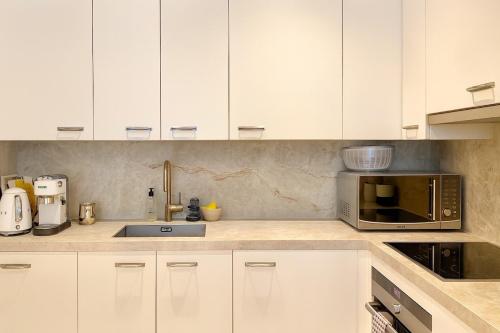 Η κουζίνα ή μικρή κουζίνα στο New Luxury Spacious Apartment, Centrally located