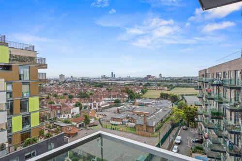 an apartment balcony with a view of a city at Luxury Wembley Apt - 9 guests! in London