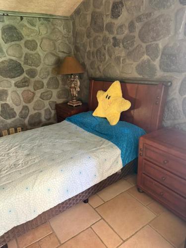 Ένα ή περισσότερα κρεβάτια σε δωμάτιο στο Los Encantos