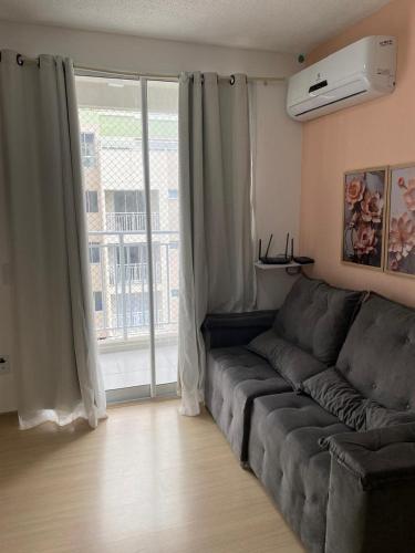 Posezení v ubytování Apartamento aconchegante