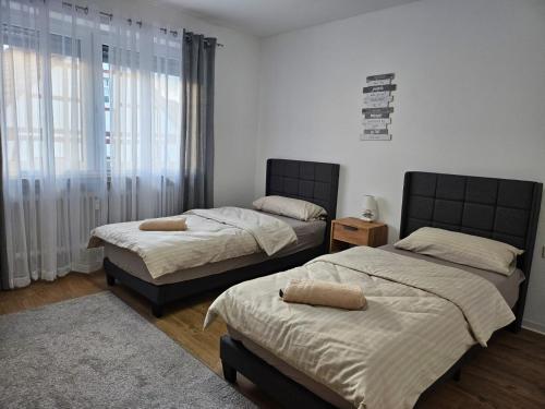 Ένα ή περισσότερα κρεβάτια σε δωμάτιο στο Apartment SIANA