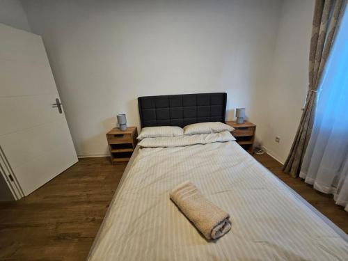 Ένα ή περισσότερα κρεβάτια σε δωμάτιο στο Apartment SIANA